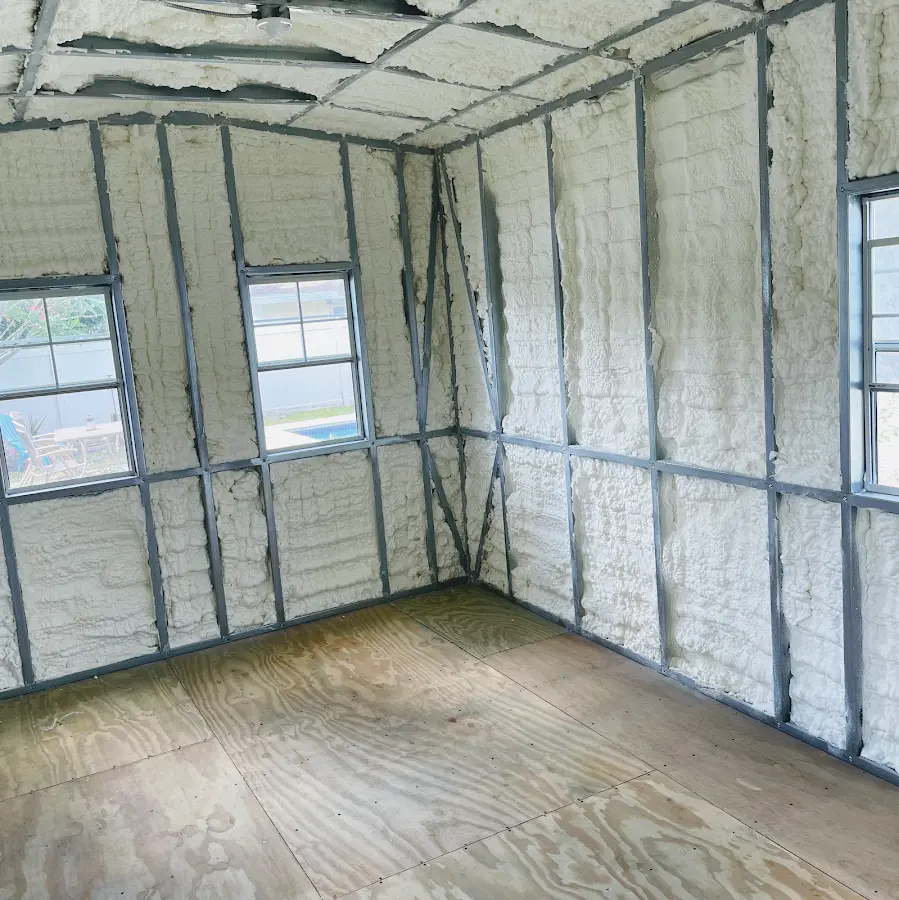 Closed-cell spray foam insulation applied to wall cavities in a residential project in Grosse Pointe Farms